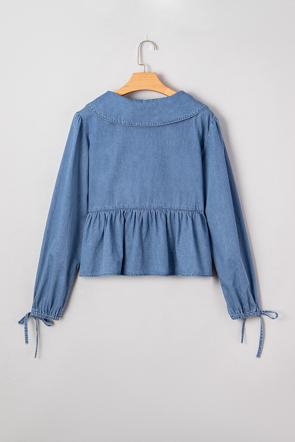 Dusk Blue Denim Lapel Neck Balloon Sleeve Tied Peplum Top